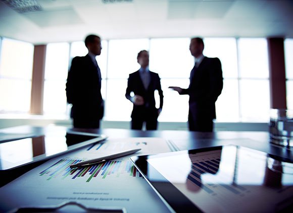 Three Men In A Boardroom