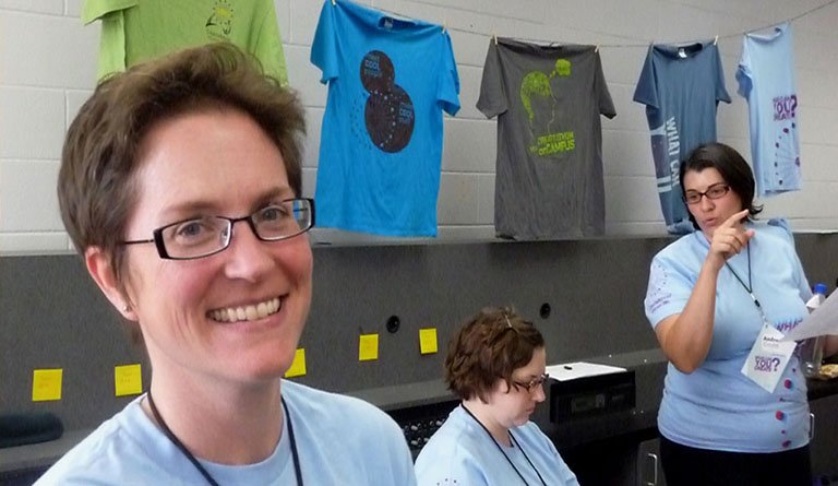 Women With T-Shirts In Print Shop