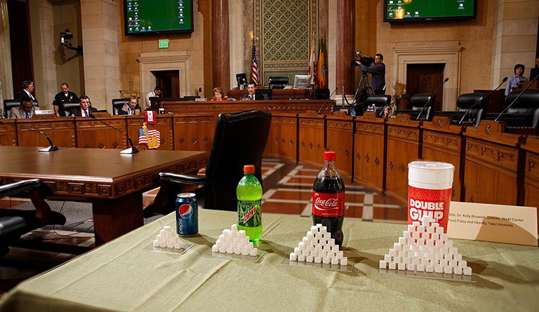 Sugar Cubes On Display I Front Of The Beverage They Represent